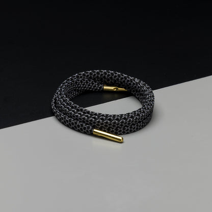 Ropies Flat Shoelaces · Black/Dark Grey/Gold Tip